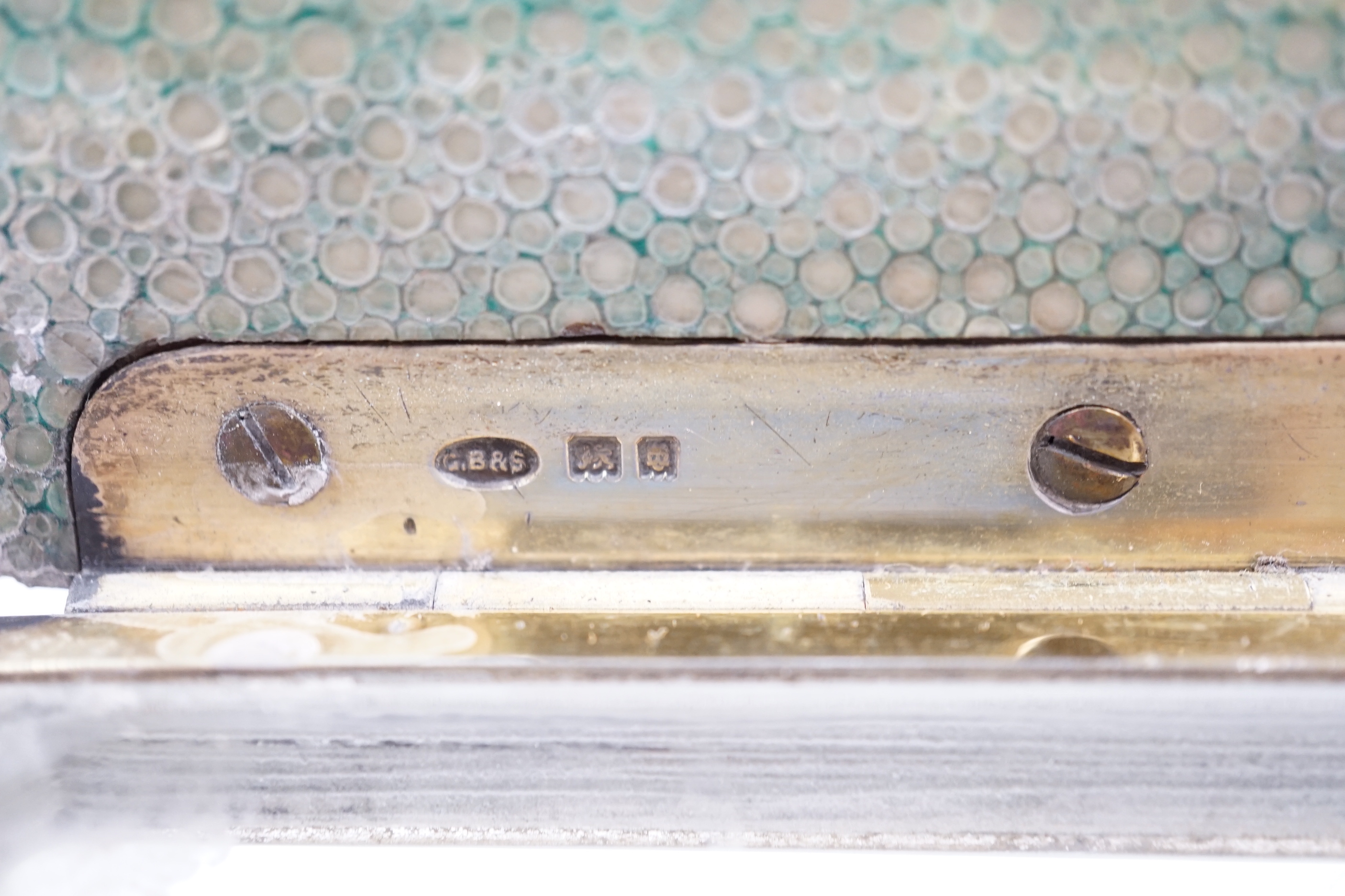 A George V silver and shagreen mounted glass square toilet box, with hinged cover, by George Betjemann & Sons Ltd, London, 1927, retailed by Asprey, London, width 94mm.